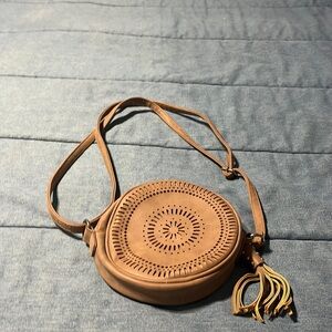 Cute round faux leather purse with adjustable straps